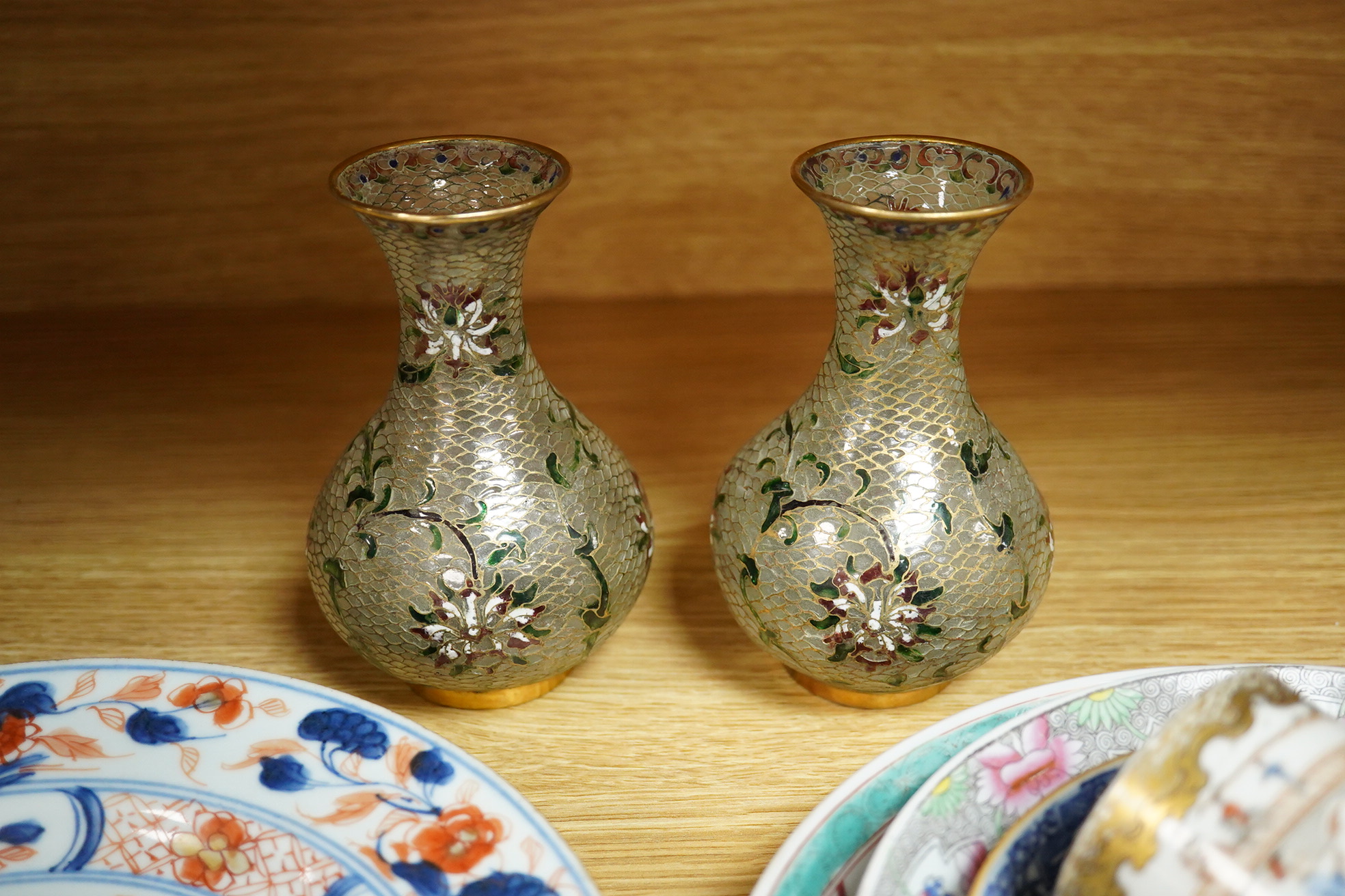 A pair of plique au jour Chinese vases together with a collection of Chinese export plates and dishes, largest 22cm in diameter